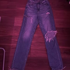 American Eagle size 4, 26 waist jeans. Medium wash and ripped, very flattering
